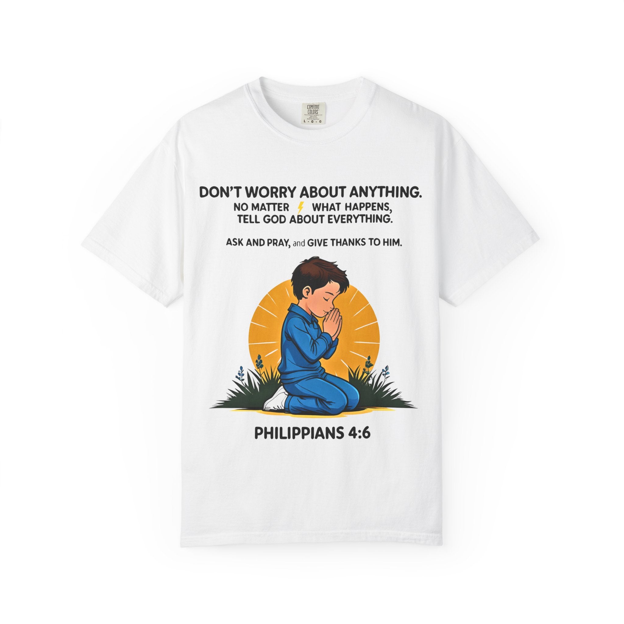 White t-shirt with a praying person graphic and inspirational text on a white background
